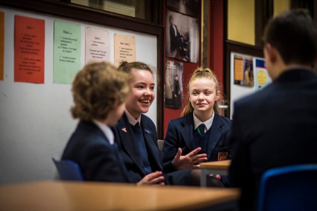 A group of pupils enjoying a conversation in their tutor group