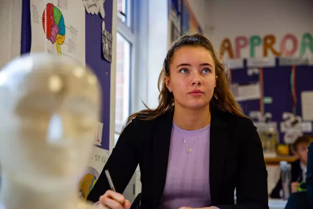 A Sixth Form girl studying in the classroom