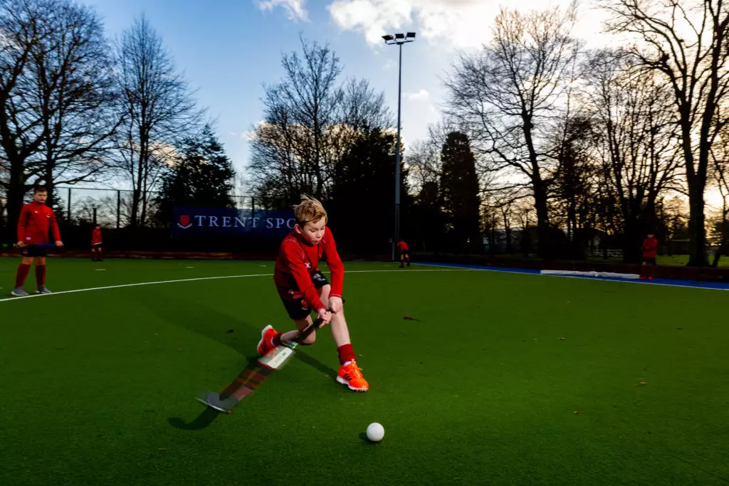 Young boy playing hockey