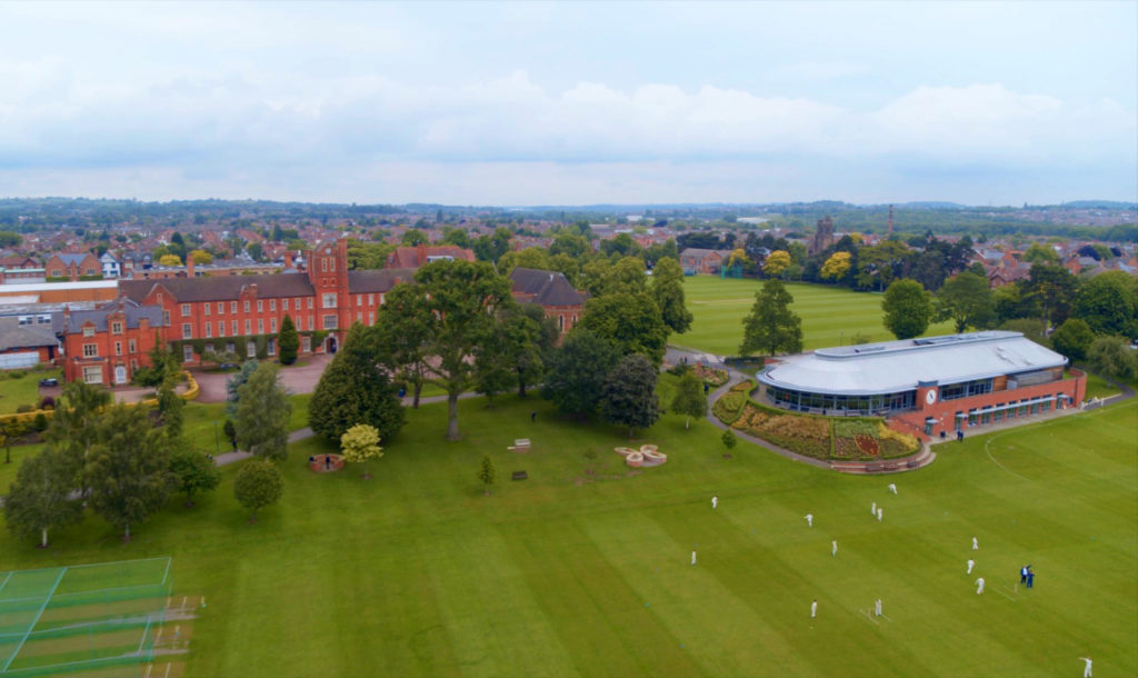 Panoramic view of Trent College campus showing playing fields and buildings