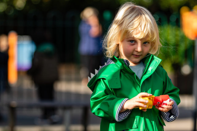 pre-school child in the grounds of the The Elms nursery and pre-school