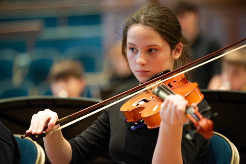 Lower school pupil plays violin at the Albert Hall